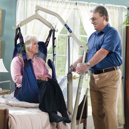 Patient hydraulic lift with a sitting sling