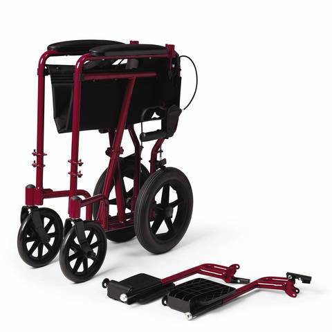Transport wheelchair folded with foot rest taken out