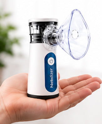 Portable mesh Nebulizer resting in an open palm